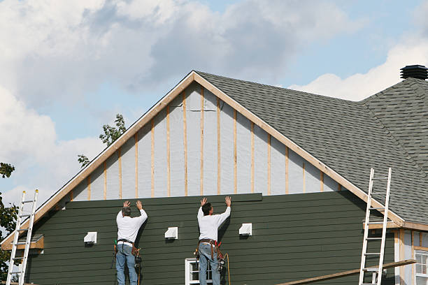 Professional Siding technician working in Trinity, NC